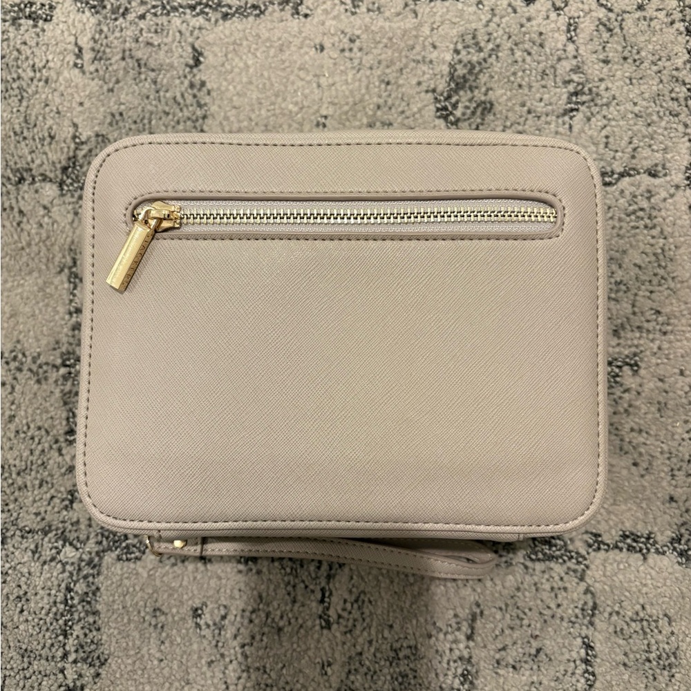 Chic Beige Cosmetic Bag with Gold Accents
